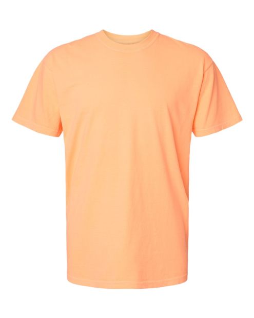 A blank short-sleeved, crew-neck t-shirt in a peach color