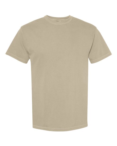 A plain, short-sleeved, crew-neck t-shirt in a light beige
