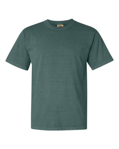 A plain, short-sleeved, t-shirt in a muted teal or seafoam green color