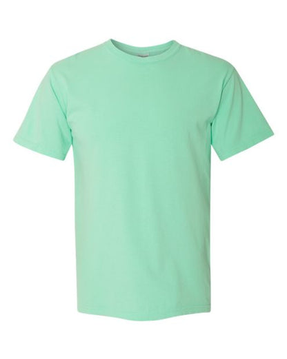 A plain, light green, short-sleeved t-shirt