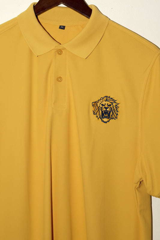 Yellow polo shirt on a hanger against a white background