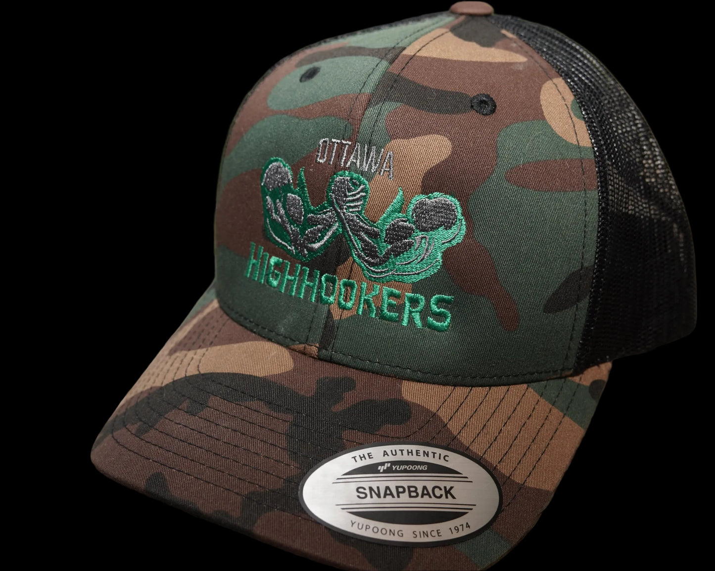 A camouflage snapback trucker hat