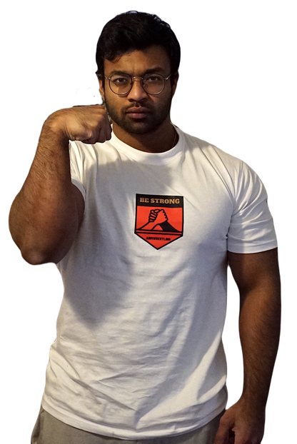 Man wearing a white t-shirt with a red and black logo on a white background